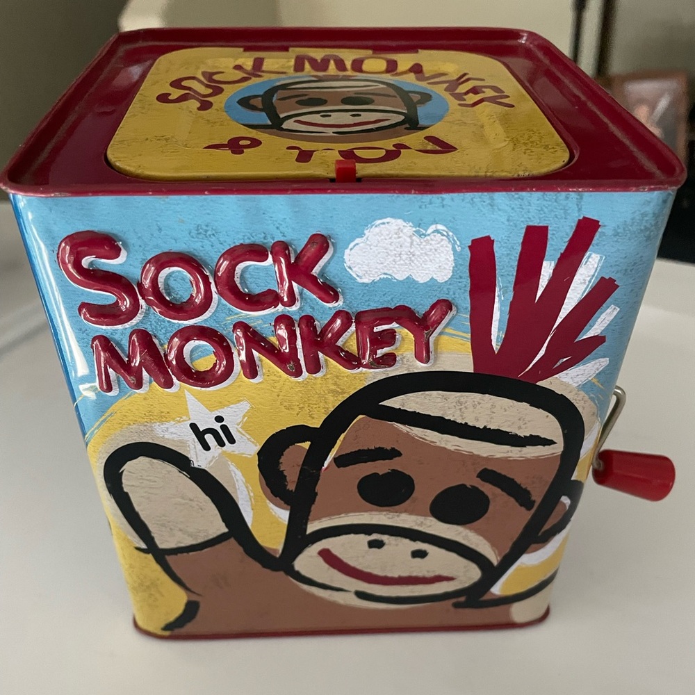 SOCK MONKEY JACK IN THE BOX this is gently used.